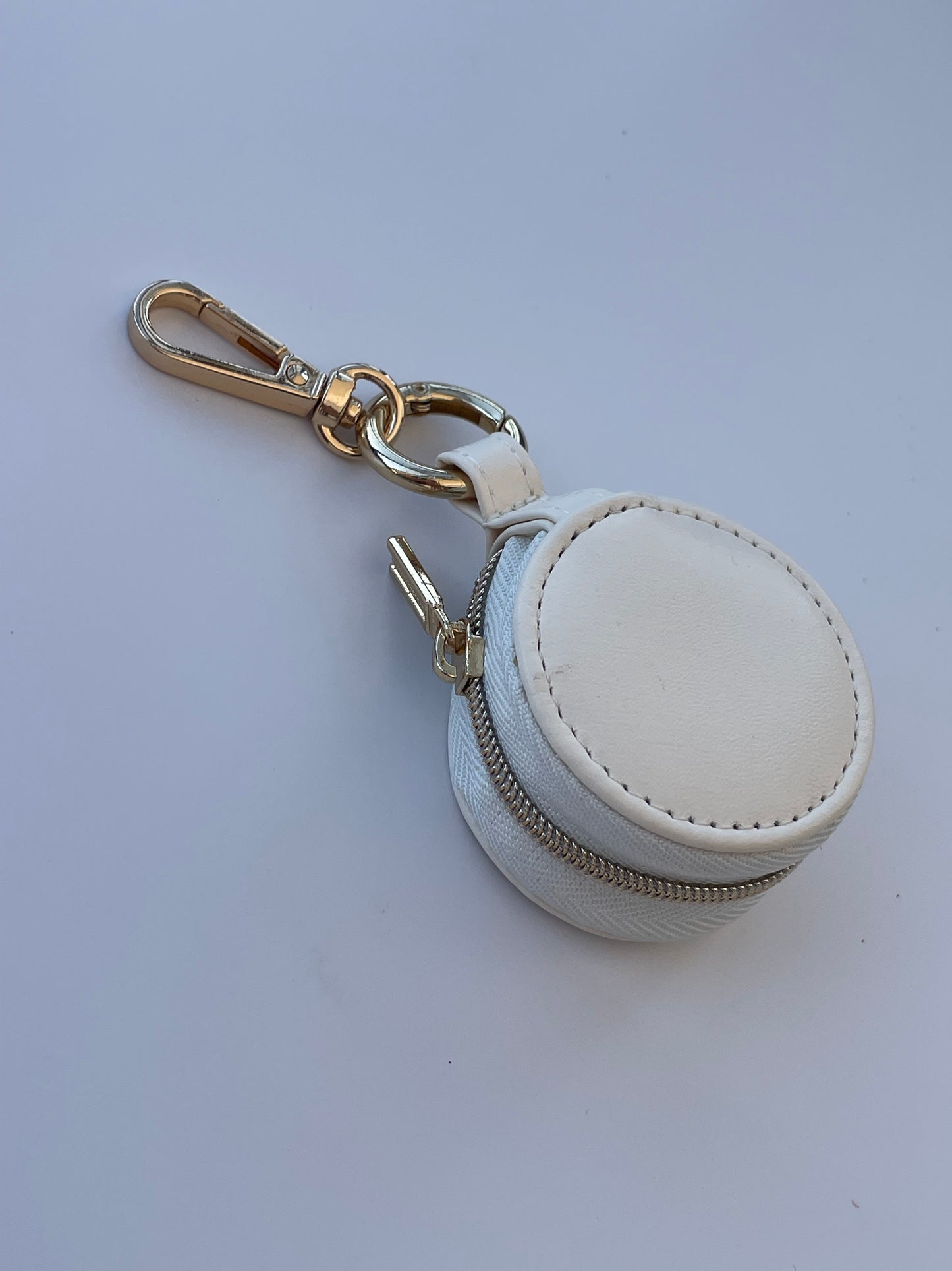 mini guarda-jóias rendondo em porta-chaves